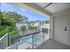 Upper level balcony overlooking the refreshing pool at 2430 Floyd St, Sarasota, FL 34239