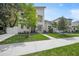 Modern home's exterior showcasing a contemporary design and lush landscaping at 2446 Floyd St, Sarasota, FL 34239