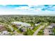 Aerial view of a house near a lake in a community at 8607 51St W Ave, Bradenton, FL 34210