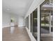Spacious sunroom with walls of windows and tile floors at 4709 Foy Pl, Sarasota, FL 34243