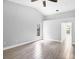 Spacious bedroom with tile floors and access to bathroom at 4709 Foy Pl, Sarasota, FL 34243