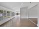 Bright sunroom featuring tile floors and backyard access at 4709 Foy Pl, Sarasota, FL 34243