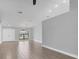 Open living area with tile flooring and high ceilings at 4709 Foy Pl, Sarasota, FL 34243
