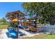 Community kayak storage with covered racks at 191 Palm Air Dr, Osprey, FL 34229