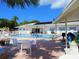 Inviting community pool with surrounding patio furniture at 191 Palm Air Dr, Osprey, FL 34229