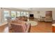 Spacious living room featuring hardwood floors and ample natural light at 191 Palm Air Dr, Osprey, FL 34229