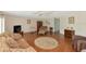 Comfortable living room with hardwood floors and plenty of seating at 191 Palm Air Dr, Osprey, FL 34229