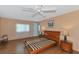 Spacious bedroom with wood flooring and a ceiling fan at 191 Palm Air Dr, Osprey, FL 34229