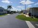 Quiet residential street in a well-maintained 55+ community at 191 Palm Air Dr, Osprey, FL 34229