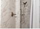 Clean and modern shower with marble tile at 191 Palm Air Dr, Osprey, FL 34229