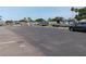 Community boat and RV storage area with parking spaces at 191 Palm Air Dr, Osprey, FL 34229