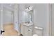 Small bathroom with a single sink vanity and toilet at 8980 Artisan Way, Sarasota, FL 34240