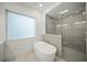 Modern bathroom featuring a freestanding tub and a glass shower at 2420 Floyd St, Sarasota, FL 34239