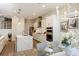Open concept kitchen with island and dining area at 725 Anegada Ln, Sarasota, FL 34234