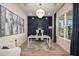 Dedicated home office with built-in shelving and natural light at 725 Anegada Ln, Sarasota, FL 34234