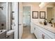Modern bathroom with double vanity and updated fixtures at 725 Anegada Ln, Sarasota, FL 34234