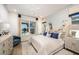 Bright bedroom with king-size bed, water views, and stylish decor at 725 Anegada Ln, Sarasota, FL 34234