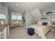 Spacious bedroom with water views and stylish decor at 725 Anegada Ln, Sarasota, FL 34234