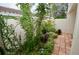 Landscaped garden with flowering vines at 6101 34Th W St # 1E, Bradenton, FL 34210