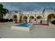 Elegant building with a grand entrance and central fountain at 6101 34Th W St # 1E, Bradenton, FL 34210