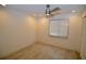 Well-lit bedroom featuring wood-look floors and window with blinds at 6101 34Th W St # 1E, Bradenton, FL 34210