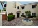 Building exterior featuring a courtyard with a fountain at 6101 34Th W St # 1E, Bradenton, FL 34210