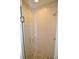 Modern shower with glass enclosure and pebble stone floor at 6101 34Th W St # 1E, Bradenton, FL 34210