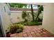 Charming courtyard with tile and various plants at 6101 34Th W St # 1E, Bradenton, FL 34210