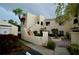Inviting condo building with courtyard fountain and landscaping at 6101 34Th W St # 1E, Bradenton, FL 34210