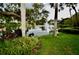Peaceful lake with fountain and lush greenery at 6101 34Th W St # 1E, Bradenton, FL 34210