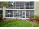 Screened porch overlooking grassy area at 6101 34Th W St # 1E, Bradenton, FL 34210