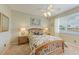 Guest bedroom with a queen bed, nightstands, and water view at 2002 Bal Harbor Blvd # 1311, Punta Gorda, FL 33950