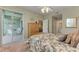 Bright bedroom with a queen bed and private balcony access at 2002 Bal Harbor Blvd # 1311, Punta Gorda, FL 33950