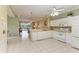 Well-lit kitchen with white cabinets and modern appliances at 2002 Bal Harbor Blvd # 1311, Punta Gorda, FL 33950