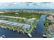 Aerial perspective showcasing canal-front property and community at 2002 Bal Harbor Blvd # 1311, Punta Gorda, FL 33950