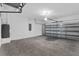 Empty garage with overhead door and concrete floor at 12154 Van Loon Ave, Port Charlotte, FL 33981