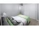 Comfortable bedroom featuring a soft bed, side table, and closet space for relaxation at 2344 Bay W St, Sarasota, FL 34237