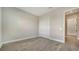 Bedroom featuring wood-look flooring, a double-door closet and a hallway at 429 Alberata Way, Nokomis, FL 34275
