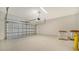 Spacious garage with speckled floors and an automatic door at 429 Alberata Way, Nokomis, FL 34275