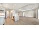 Open-concept living area with recessed lighting and modern finishes, flowing into the kitchen at 429 Alberata Way, Nokomis, FL 34275