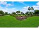 Community fitness park in a scenic area with manicured landscaping at 5415 Limelight Dr, Apollo Beach, FL 33572