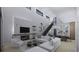 Spacious living room features a fireplace and large windows at 2344 Bay W St, Sarasota, FL 34237
