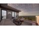 Relaxing rooftop deck with city views and comfortable seating at 2344 Bay W St, Sarasota, FL 34237