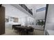 Open concept dining and kitchen with modern finishes and a two-story ceiling at 2344 Bay W St, Sarasota, FL 34237