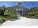 Gray community clubhouse with pool access at 5201 Highbury Cir, Sarasota, FL 34238