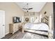 Large bedroom with a king-size bed and plenty of natural light at 5201 Highbury Cir, Sarasota, FL 34238
