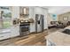 Modern kitchen with stainless steel appliances and white cabinets at 5201 Highbury Cir, Sarasota, FL 34238