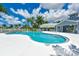 Community pool and clubhouse, perfect for relaxation at 5201 Highbury Cir, Sarasota, FL 34238