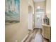Bright and airy entryway with light flooring, and decorative elements at 5201 Highbury Cir, Sarasota, FL 34238