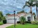 Single Gathering home with attached garage and landscaped yard at 5201 Highbury Cir, Sarasota, FL 34238